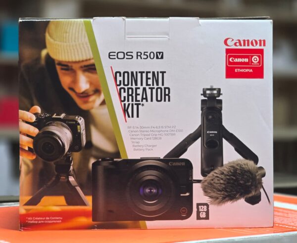 Canon EOS R50V Content Creator Kit — mirrorless camera with lens, tripod, mic, and SD card Bluescale